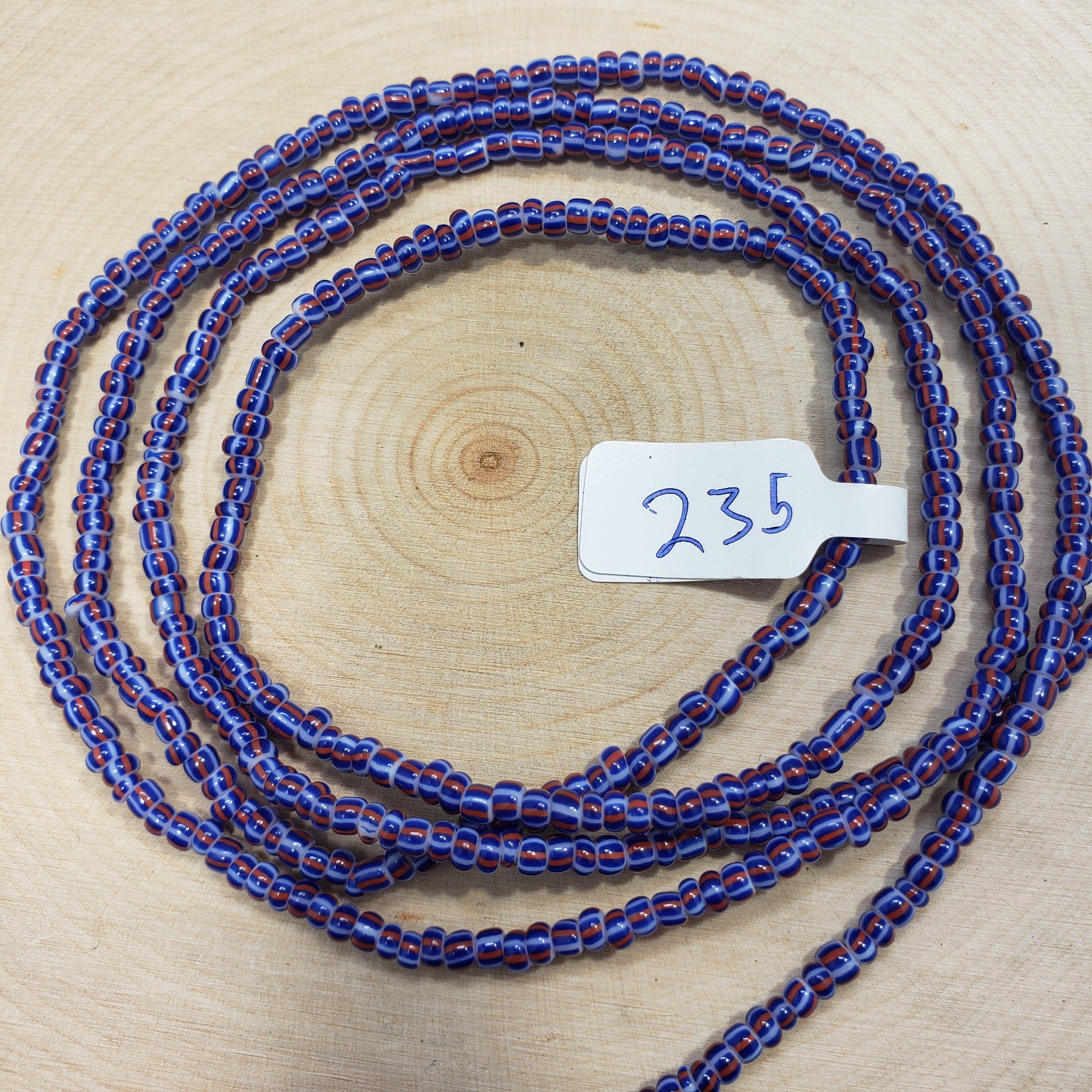 Navy Blue with Light Blue and Red Striped Waist Beads